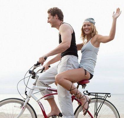 Couple riding bike